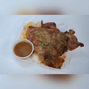 Grilled Pork chop over rice