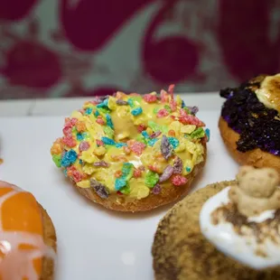 The 1 and ONLY UNICORN BUTTSNEEZE!! A lemon glaze topped with Fruity Pebbles. Always Made to Order