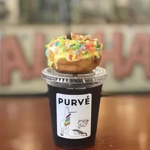 Unicorn Butt Sneeze donut and cold brew coffee from Purvé Donut Stop Hawaii who proudly served Kai Coffee