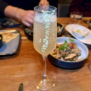 Sweater Weather - vodka, red rice sake, laird's apple brandy bottled in bond, cinnamon, lemon, cava, pumpkin spice tincture