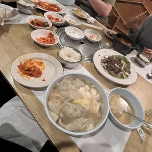 Dumpling soup, bulgogi, side dishes