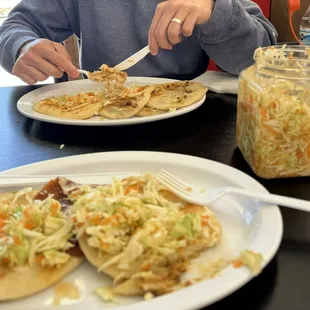 Pupusas with extra curtido on the side.