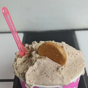 Three scoops containing hazelnut, espresso crunch, and amaretto.
