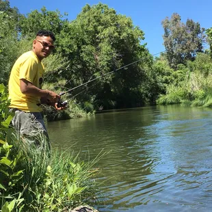 Fishing and wading in the water on Memorial Day weekend