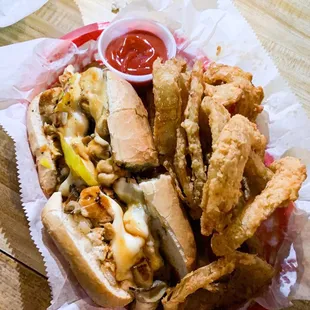 Mushroom cheeseburger sub and teriyaki chicken philly