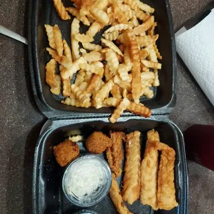 Fries and fish sticks with slaw and tartar sauce