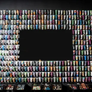 Our colorful wall of putter covers illustrates our love of putting well