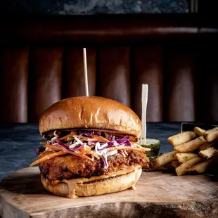 a pulled pork sandwich and fries