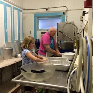 Our volunteers and camp kids hard at work.