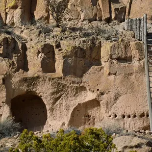 You can just see the hand-rails built into the ladder at the top to get to the mid-level of Puye Cliff Dwellings, NM