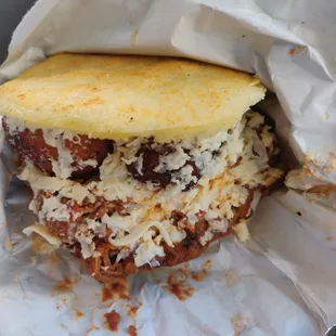 a sandwich wrapped in foil