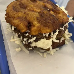 Patacon Pintón - all veggies sure but savory &amp; satisfying and rich!  Fried sweet plantain outsides bean and cheese &amp; cabbage on the inside.