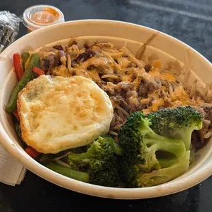 Cha - Bop: Beef Brisket, Bean Sprouts, Grilled broccoli, Rice, Peppers, and Egg over rice drizzled with spicy mayo