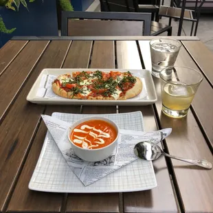 Whiskey sour, tomato basil soup and a margarita pizza (probably misspelled).