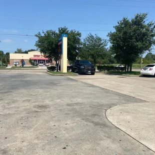 a parking lot with cars parked in it