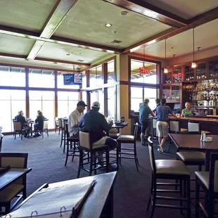 people sitting at the bar