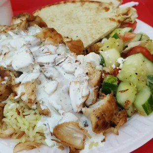 a plate of food on a red tray