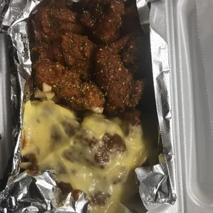 Hot Lemon Pepper wings with Chili Cheese Fries!