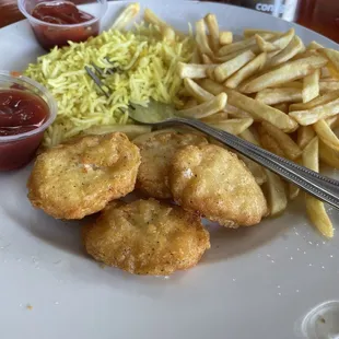 The nuggets had a fresh glaze of oil on them and the fries were double crisped. Rice was great!