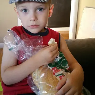 My son Carter ... decided the bag of Pyrenees French bread was a super snack idea!
