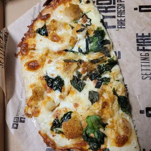 Chicken, spinach, garlic pizza with alfredo sauce