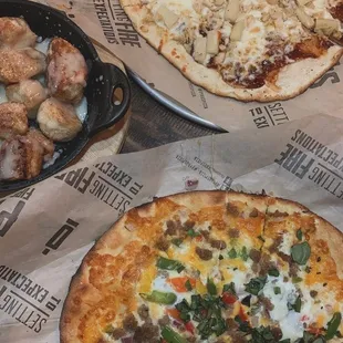 Breakfast pizza , cinnamon roll bites and a chicken bbq pineapple pizza.