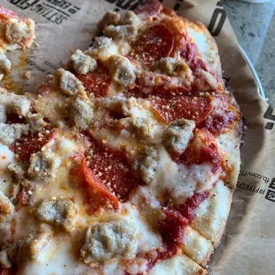 Pepperoni and Italian sausage pizza.