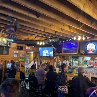 people sitting at the bar