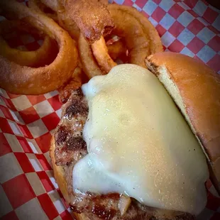 Mushroom and Swiss burger with onion rings