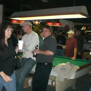 DRINK A BEER AT THE Q