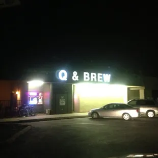 Q&amp;Brew at night. Look for the sign.