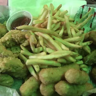 Appetizer sampler. Comes with fries, chicken tenders, mozzarella sticks and jalapeño poppers.