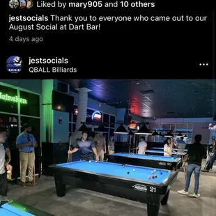 a group of people playing pool