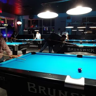 people playing pool