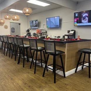  restaurant with a bar and televisions