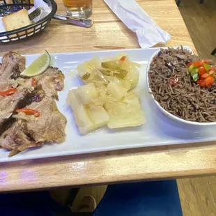 Roast pork, yucca and moro rice.