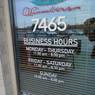 Hours of operation, front entry door.