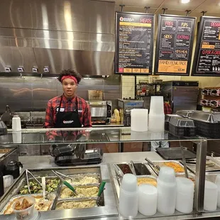 Restaurant interior with menu and food trays