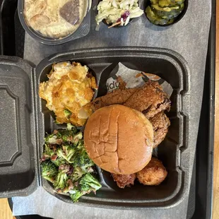 Southern-Style Fried Brisket Sandwich, cheesy potatoes, broccoli salad, and banana pudding