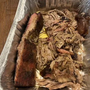 pulled pork in a foil container