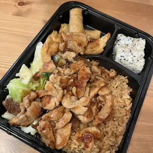Bento Box: Chicken &amp; Beef hibachi, fried rice, vegetables, 2 dumplings, 2 spring, 4 pieces of California Roll. $12 as of 11/28/23