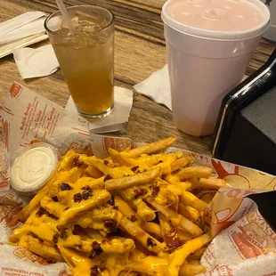 Chili cheese fries, pink lemonade, midori sour