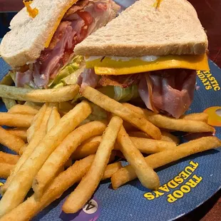Club Sandwich on Sourdough w/ fries.
