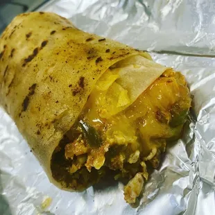 Chorizo deluxe breakfast burrito!! OH MYYYY GAWWWD! If you like grilled onions and jalapeños.... this is FOR YOU! Go try it!