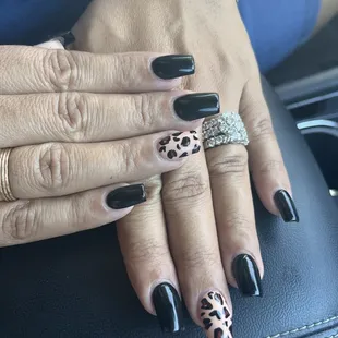 Black with one leopard accent nail