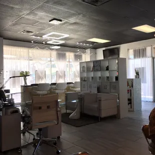 The entrance, waiting area, and a manicure bar! They offer you refreshing beverages while you're being served.