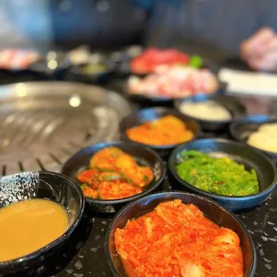 a variety of dishes of food on a table