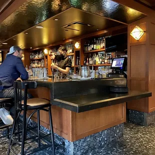 a man sitting at the bar