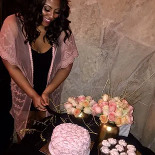 A beautiful pink champaign cake and chocolate mini cupcakes for a champaign brunch party at Vintage.