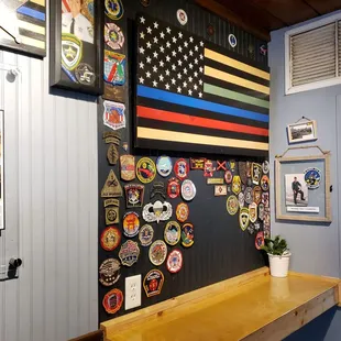 a wooden table with a bunch of stickers on it